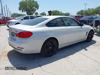 2015 BMW 4 Series 428i xDrive z VIN WBA3N5C58FK198825, wystawiony jako IAAI lot #41919172 z przebiegiem 125 421 mil mil oraz . Historia ofert i sprzedaży dostępna na DreamBid. Obrazek 4.
