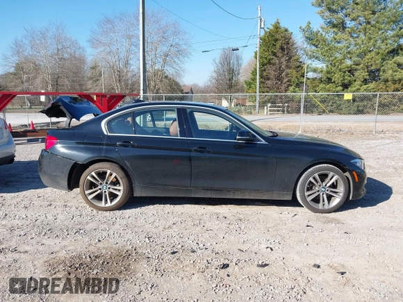 2017 BMW 3 Series 330i with VIN WBA8B9C58HK675536, listed as a IAAI auction lot 41665254 with 122,098 mi miles. Bid and sale history available at carsss.com. Image 13.