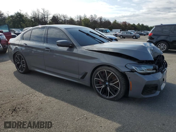 2022 BMW 5 Series M550i xDrive z VIN WBA13BK00NCJ03264, wystawiony jako Copart lot #68976084 z przebiegiem 39 515 mil mil oraz Szkoda całkowita • Salvage title. Historia ofert i sprzedaży dostępna na DreamBid. Obrazek 4.