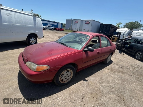 2000 Ford Escort z VIN 3FAFP13PXYR258385, wystawiony jako Copart lot #57472665 z przebiegiem 79 947 mil mil oraz Czysty tytuł • Clean title. Historia ofert i sprzedaży dostępna na DreamBid. Obrazek 2.