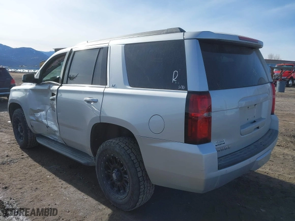 2019 Chevrolet Tahoe LT with VIN 1GNSKBKC4KR388622, listed as a IAAI auction lot 41643966 with 96,298 mi miles. Bid and sale history available at carsss.com. Image 3.