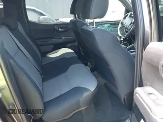 2023 Toyota Tacoma SR5 z VIN 3TMDZ5BN6PM153633, wystawiony jako IAAI lot #42353187 z przebiegiem 50 020 mil mil oraz . Historia ofert i sprzedaży dostępna na DreamBid. Obrazek 8.