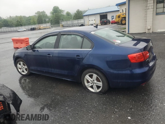 2013 Volkswagen Jetta TDI w/Premium with VIN 3VW3L7AJ2DM387655, listed as a Copart auction lot 56869615 with Not provided miles and Clean title. Bid and sale history available at DreamBid. Image 2.