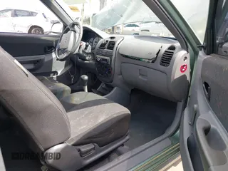2003 Hyundai Accent GL with VIN KMHCG35C53U277734, listed as a IAAI auction lot 42085996 with 108,369 mi miles. Bid and sale history available at carsss.com. Image 5.