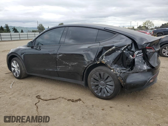 2023 Tesla Model Y Long Range with VIN 7SAYGDEE1PF923998, listed as a Copart auction lot 48954205 with 21,525 mi miles and Salvage Title. Bid and sale history available at DreamBid. Image 2.