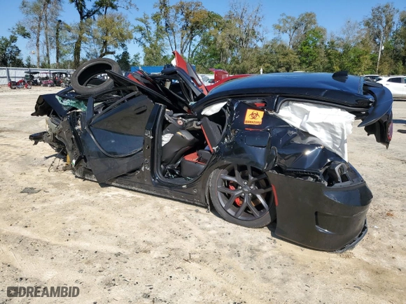 2019 Dodge Charger Scat Pack with VIN 2C3CDXGJ1KH735923, listed as a Copart auction lot 49290465 with 0 mi miles and Non Repairable. Bid and sale history available at carsss.com. Image 2.