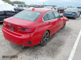 2021 BMW 3 Series 330i xDrive with VIN 3MW5R7J0XM8B84956, listed as a IAAI auction lot 41924406 with 76,129 mi miles. Bid and sale history available at carsss.com. Image 4.