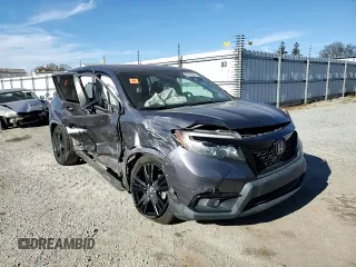 2019 Honda Passport Sport z VIN 5FNYF7H22KB000618, wystawiony jako Copart lot #80560084 z przebiegiem Nie podano mil oraz Szkoda całkowita • Salvage title. Historia ofert i sprzedaży dostępna na DreamBid. Obrazek 12.