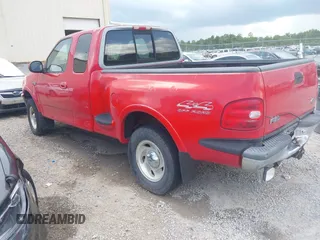 1997 Ford F-150 with VIN 1FTDX08W2VKC17809, listed as a IAAI auction lot 42541525 with 143,963 mi miles and . Bid and sale history available at DreamBid. Image 3.