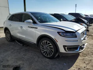 2019 Lincoln Nautilus Reserve with VIN 2LMPJ6LPXKBL21200, listed as a Copart auction lot 85203634 with 60,728 mi miles and Salvage Title. Bid and sale history available at carsss.com. Image 4.