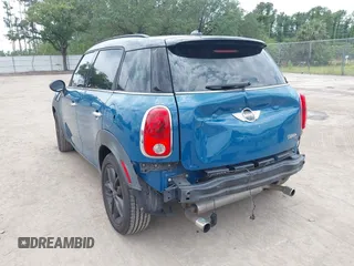 2012 MINI Countryman S with VIN WMWZC3C56CWM27592, listed as a IAAI auction lot 42175396 with 147,600 mi miles and . Bid and sale history available at DreamBid. Image 3.