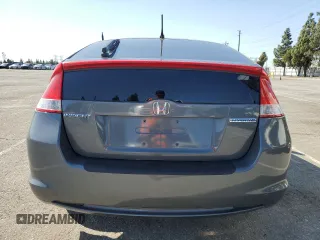 2010 Honda Insight EX z VIN JHMZE2H73AS034380, wystawiony jako Copart lot #49178935 z przebiegiem 214 256 mil mil oraz Szkoda całkowita • Salvage title. Historia ofert i sprzedaży dostępna na DreamBid. Obrazek 6.