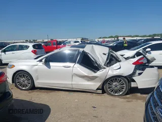 2016 Ford Fusion SE with VIN 3FA6P0T97GR239612, listed as a IAAI auction lot 42009642 with 156,659 mi miles and . Bid and sale history available at DreamBid. Image 14.