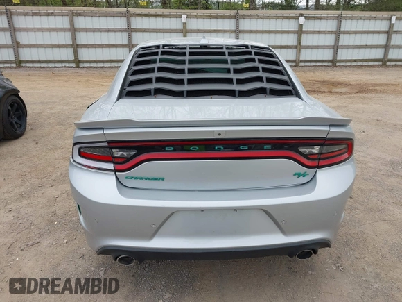 2021 Dodge Charger R/T with VIN 2C3CDXCT7MH652202, listed as a IAAI auction lot 42059667 with 52,244 mi miles and . Bid and sale history available at carsss.com. Image 16.