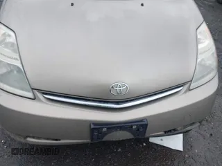 2006 Toyota Prius z VIN JTDKB20U067517414, wystawiony jako IAAI lot #42251158 z przebiegiem 233 266 mil mil oraz . Historia ofert i sprzedaży dostępna na DreamBid. Obrazek 6.