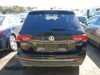 2018 Volkswagen Tiguan SEL z VIN 3VV2B7AX9JM142564, wystawiony jako IAAI lot #40630666 z przebiegiem 86 040 mil mil oraz . Historia ofert i sprzedaży dostępna na DreamBid. Obrazek 16.