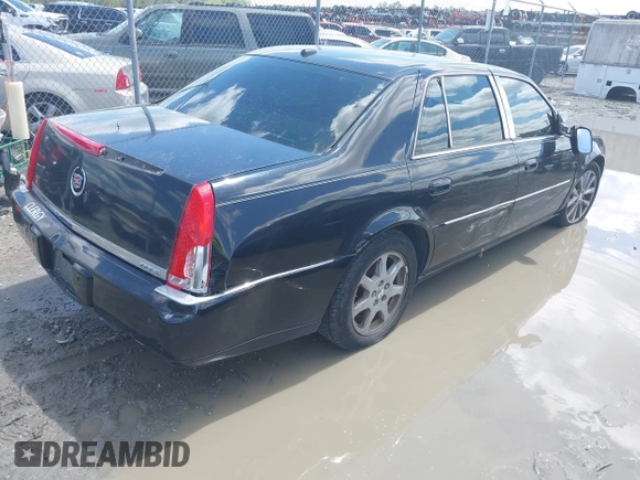2006 Cadillac DTS 1SE with VIN 1G6KD57976U126634, listed as a IAAI auction lot 41972104 with 148,992 mi miles and . Bid and sale history available at DreamBid. Image 4.