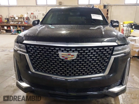 2021 Cadillac Escalade Luxury z VIN 1GYS4AKL7MR295510, wystawiony jako IAAI lot #38398966 z przebiegiem 26 228 mil mil oraz . Historia ofert i sprzedaży dostępna na DreamBid. Obrazek 12.