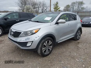 2013 Kia Sportage EX with VIN KNDPCCA22D7484936, listed as a IAAI auction lot 41921531 with 128,001 mi miles and . Bid and sale history available at DreamBid. Image 2.