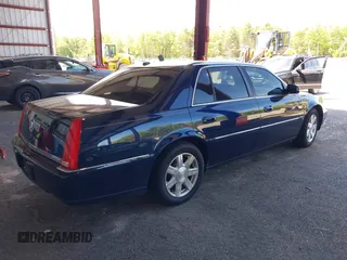 2007 Cadillac DTS Luxury I z VIN 1G6KD57Y17U160951, wystawiony jako IAAI lot #42298405 z przebiegiem 137 899 mil mil oraz . Historia ofert i sprzedaży dostępna na DreamBid. Obrazek 4.