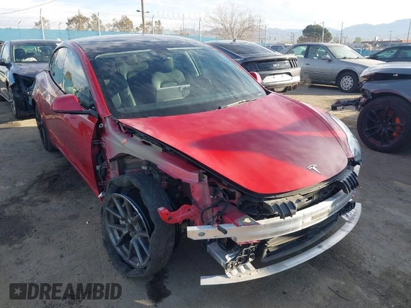 2022 Tesla Model 3 with VIN 5YJ3E1EA1NF288903, listed as a IAAI auction lot 41610215 with 96,050 mi miles and . Bid and sale history available at DreamBid. Image 1.