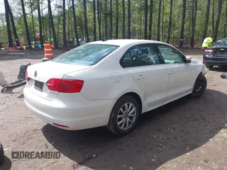 2013 Volkswagen Jetta Sedan SE with VIN 3VWDP7AJXDM201451, listed as a IAAI auction lot 41994783 with 136,112 mi miles. Bid and sale history available at carsss.com. Image 4.