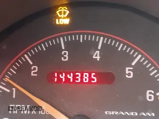 2004 Pontiac Grand Am z VIN 1G2NV12EX4M641018, wystawiony jako IAAI lot #41255352 z przebiegiem 144 385 mil mil oraz . Historia ofert i sprzedaży dostępna na DreamBid. Obrazek 16.