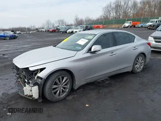 2014 Infiniti Q50 Hybrid Premium with VIN JN1AV7AR9EM700727, listed as a IAAI auction lot 41461433 with 169,882 mi miles. Bid and sale history available at carsss.com. Image 17.