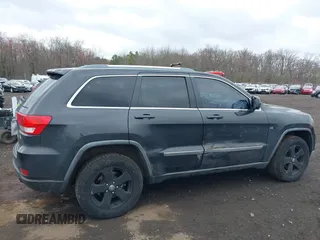2011 Jeep Grand Cherokee Laredo with VIN 1J4RR4GGXBC597743, listed as a IAAI auction lot 41897286 with 253,111 mi miles and . Bid and sale history available at DreamBid. Image 6.