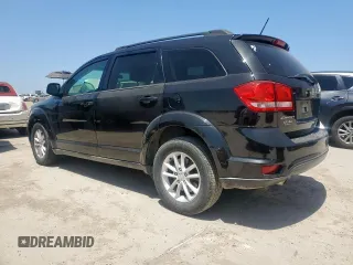 2013 Dodge Journey SXT with VIN 3C4PDCBGXDT557800, listed as a Copart auction lot 64415275 with 179,157 mi miles and Clean title. Bid and sale history available at DreamBid. Image 2.