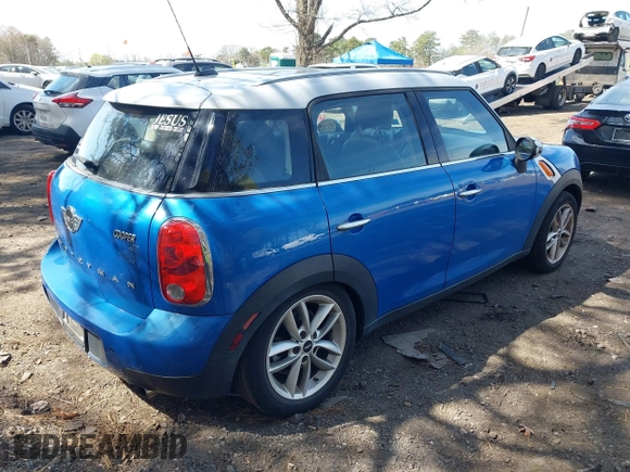 2014 MINI Countryman with VIN WMWZB3C59EWR37439, listed as a IAAI auction lot 42110149 with 181,661 mi miles and . Bid and sale history available at DreamBid. Image 4.