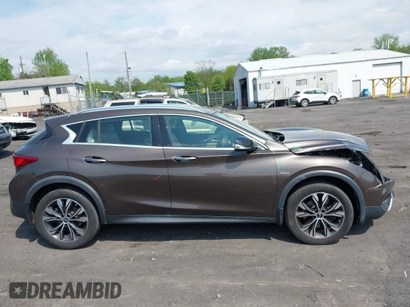 2018 Infiniti QX30 Premium z VIN SJKCH5CR0JA051889, wystawiony jako IAAI lot #42234392 z przebiegiem 104 095 mil mil oraz . Historia ofert i sprzedaży dostępna na DreamBid. Obrazek 13.
