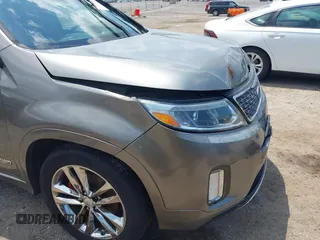 2014 Kia Sorento SX z VIN 5XYKWDA75EG461948, wystawiony jako IAAI lot #42180084 z przebiegiem 123 917 mil mil oraz . Historia ofert i sprzedaży dostępna na DreamBid. Obrazek 18.