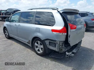 2013 Toyota Sienna LE AAS with VIN 5TDKK3DC4DS399295, listed as a IAAI auction lot 42173970 with 128,350 mi miles and . Bid and sale history available at DreamBid. Image 3.