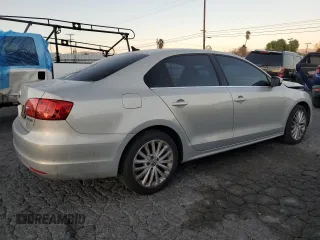 2012 Volkswagen Jetta Sedan SEL w/Sunroof with VIN 3VWLX7AJ7CM310458, listed as a Copart auction lot 87670525 with 142,944 mi miles and Salvage Title. Bid and sale history available at carsss.com. Image 3.