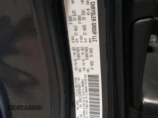 2011 Jeep Grand Cherokee Laredo with VIN 1J4RS4GG9BC517059, listed as a Copart auction lot 52704705 with 120,171 mi miles and Salvage Title. Bid and sale history available at DreamBid. Image 12.
