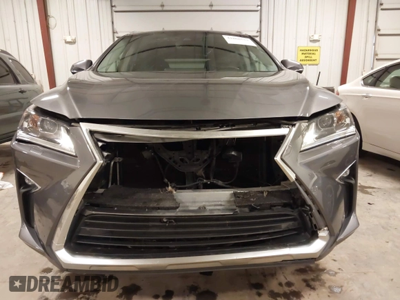 2017 Lexus RX 350 with VIN 2T2BZMCA7HC121812, listed as a IAAI auction lot 41868533 with 101,128 mi miles and . Bid and sale history available at DreamBid. Image 13.