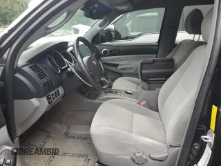 2010 Toyota Tacoma PreRunner with VIN 3TMJU4GN3AM097601, listed as a Copart auction lot 57703415 with 227,978 mi miles and Salvage title. Bid and sale history available at DreamBid. Image 7.
