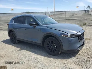 2023 Mazda CX-5 2.5 S Carbon Edition with VIN JM3KFBCM0P0256626, listed as a Copart auction lot 50818685 with 13,338 mi miles and Salvage Title. Bid and sale history available at carsss.com. Image 4.