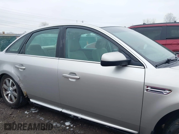 2008 Ford Taurus SEL with VIN 1FAHP24W68G122802, listed as a IAAI auction lot 42020217 with 168,265 mi miles. Bid and sale history available at carsss.com. Image 13.