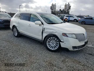 2012 Lincoln MKT EcoBoost with VIN 2LMHJ5AT9CBL52373, listed as a Copart auction lot 51474715 with 98,905 mi miles and Salvage Title. Bid and sale history available at DreamBid. Image 4.