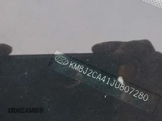 2018 Hyundai Tucson SE z VIN KM8J2CA41JU807280, wystawiony jako IAAI lot #42301977 z przebiegiem 62 415 mil mil oraz . Historia ofert i sprzedaży dostępna na DreamBid. Obrazek 17.