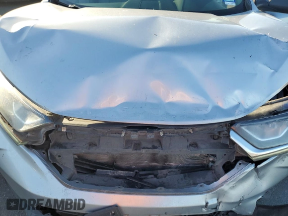 2018 Honda CR-V LX z VIN 2HKRW6H3XJH203604, wystawiony jako Copart lot #89002705 z przebiegiem 77 628 mil mil oraz Szkoda całkowita • Salvage title. Historia ofert i sprzedaży dostępna na DreamBid. Obrazek 12.