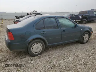 2002 Volkswagen Jetta с VIN 3VWSB29M42M068867, выставлен на аукционе Copart как лот 67406454 с пробегом 214 613 миль миль и Списание • Salvage title. История ставок и продаж доступна на DreamBid. Изображение 3.