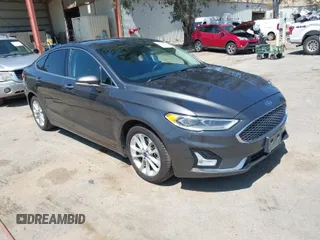 2019 Ford Fusion Energi Titanium with VIN 3FA6P0SU0KR216218, listed as a IAAI auction lot 41945813 with 141,176 mi miles. Bid and sale history available at carsss.com. Image 1.