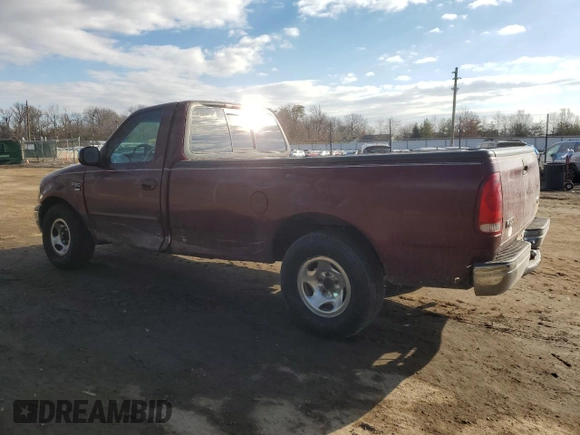 1999 Ford F-150 with VIN 1FTRF17W7XNA44872, listed as a Copart auction lot 41815695 with 182,678 mi miles and Salvage title. Bid and sale history available at DreamBid. Image 2.