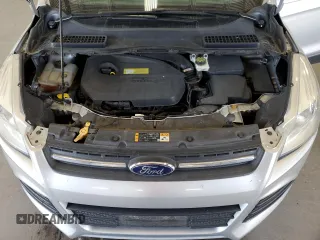 2013 Ford Escape SE with VIN 1FMCU0GXXDUB10035, listed as a Copart auction lot 56817785 with 130,497 mi miles and Salvage title. Bid and sale history available at DreamBid. Image 12.