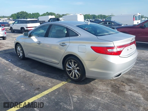 2014 Hyundai Azera z VIN KMHFG4JG9EA341354, wystawiony jako IAAI lot #42711386 z przebiegiem 144 157 mil mil oraz . Historia ofert i sprzedaży dostępna na DreamBid. Obrazek 3.