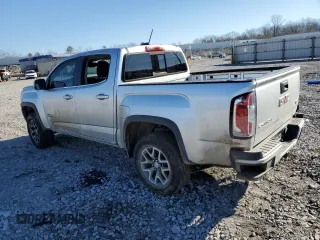 2016 GMC Canyon 4WD SLE with VIN 1GTG6CE36G1179618, listed as a Copart auction lot 82548033 with 101,095 mi miles and Salvage Title. Bid and sale history available at carsss.com. Image 2.