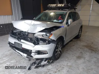 2011 Volkswagen Touareg Exec with VIN WVGFK9BP4BD005986, listed as a IAAI auction lot 41183877 with 109,005 mi miles and . Bid and sale history available at DreamBid. Image 17.